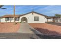 Single story home with a walkway and carport at 22312 W Hammond Dr, Buckeye, AZ 85326