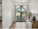 Bright and airy foyer with hardwood floors and a stylish console table at 4424 N 38Th St, Phoenix, AZ 85018