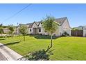 Eye-catching curb appeal with lush lawn and mature trees at 4424 N 38Th St, Phoenix, AZ 85018