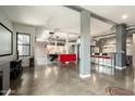 Large, unique game room with a pool table, bar, and polished concrete floors at 914 E Osborn Rd # 202, Phoenix, AZ 85014