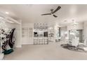 Bright, open-concept living area flows into a kitchen with modern finishes and a dining area at 5450 E Mclellan Rd # 204, Mesa, AZ 85205