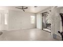 Spacious, well-lit room with a sliding glass door that leads to the outside at 5450 E Mclellan Rd # 204, Mesa, AZ 85205