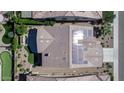 Aerial view showcasing a house with solar panels and a well-manicured lawn at 1342 E Verde Blvd, Queen Creek, AZ 85140