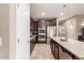 Kitchen with stainless steel appliances and an island at 314 N 79Th Pl, Mesa, AZ 85207