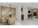 Bright dining area with a wooden table and six chairs at 3031 N Civic Center Plz # 224, Scottsdale, AZ 85251