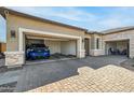 Two-car garage with ample space and direct access to the house at 6659 N 127Th Dr, Glendale, AZ 85307