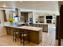 Modern kitchen with island, stainless steel appliances, and ample counter space at 7343 E Marlette Ave, Scottsdale, AZ 85250