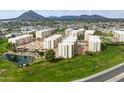 Aerial view showcasing expansive community with multiple buildings and landscaping at 7940 E Camelback Rd # 404, Scottsdale, AZ 85251