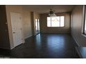 Bright dining area with tile flooring and access to backyard at 8808 W State Ave, Glendale, AZ 85305