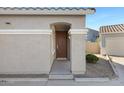 House's front door entrance with landscaping at 931 S Porter Ct, Gilbert, AZ 85296