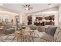 Open concept kitchen with dark cabinetry and stainless steel appliances at 1228 N 102Nd St, Mesa, AZ 85207