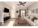 Bright living room with a neutral color palette and modern furniture at 30052 N Desert Willow Blvd, San Tan Valley, AZ 85143