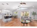 Bright and airy living room with hardwood floors and open floor plan at 5210 W Jupiter N Way, Chandler, AZ 85226