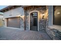 Ornate iron gate leads to private courtyard at 8537 E Leland St, Mesa, AZ 85207