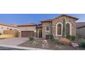 Attractive stone exterior, 2-car garage at 8537 E Leland St, Mesa, AZ 85207