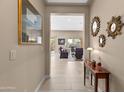 Bright hallway with view into living area, showcasing a spacious floorplan at 16807 W Berkeley Rd, Goodyear, AZ 85395