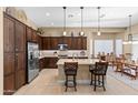 Modern kitchen with stainless steel appliances and ample cabinetry at 16807 W Berkeley Rd, Goodyear, AZ 85395