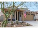 Charming single story home with landscaped yard and two car garage at 20385 W Vista Paseo Dr, Buckeye, AZ 85396