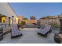 Tranquil backyard with a hot tub and lounge chairs, perfect for relaxation at 4742 S Primrose Dr, Gold Canyon, AZ 85118