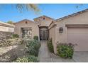 Inviting entryway to a charming single-story home at 8179 E Sierra Pinta Dr, Scottsdale, AZ 85255