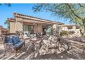 Relaxing patio with seating area, providing an outdoor oasis at 8179 E Sierra Pinta Dr, Scottsdale, AZ 85255