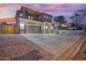 Two-story house with a large driveway and basketball hoop at 13032 N 19Th St, Phoenix, AZ 85022