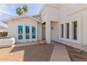 Front entrance with three windows and a walkway at 609 W Grandview Rd, Phoenix, AZ 85023