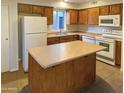 Kitchen with island and modern appliances at 16621 S 44Th Pl, Phoenix, AZ 85048