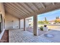 Covered patio area with a swing and view of the backyard at 4053 E Glencove St, Mesa, AZ 85205