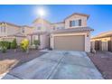 Two-story house with a two-car garage and desert landscaping at 7067 W Maya Way, Peoria, AZ 85383