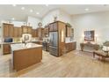 Spacious kitchen with granite countertops and wood cabinets at 9634 E Rocky Lake Dr, Sun Lakes, AZ 85248