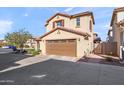 Two-story house with brown garage door and landscaping at 1255 N Banning --, Mesa, AZ 85205