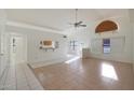 Bright living room with tile floors and high ceilings at 19822 N 43Rd Dr, Glendale, AZ 85308