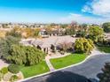 Single-story home with a large grassy yard at 100 W Sparrow Dr, Chandler, AZ 85286