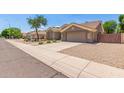 Street view showing the architectural details and curb appeal at 1231 W Hawken Way, Chandler, AZ 85286