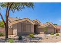 Low maintenance front yard and architectural features at 1231 W Hawken Way, Chandler, AZ 85286