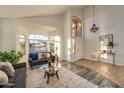 Spacious living room with high ceilings and large windows at 1763 S Red Rock St, Gilbert, AZ 85295