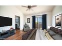 Serene main bedroom featuring a private balcony and an ensuite bathroom, creating a peaceful retreat at 2020 W Union Hills Dr # 246, Phoenix, AZ 85027