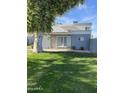 House exterior showcasing a well-maintained lawn and attractive facade at 2687 W Ocotillo Rd, Phoenix, AZ 85017