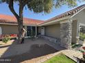 Front entrance with stone column and covered porch at 625 N 38Th N St, Mesa, AZ 85205