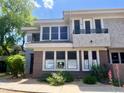 Inviting two-story home with a balcony and landscaped yard at 15221 N Clubgate Dr # 1110, Scottsdale, AZ 85254