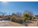 House with a large yard and wooden fence at 10407 W Catalina Dr, Avondale, AZ 85392