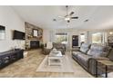 Spacious living room with fireplace and large windows at 28206 N 141St St, Scottsdale, AZ 85262