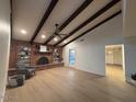 Bright living room with fireplace and hardwood floors at 1745 E Glade Ave, Mesa, AZ 85204