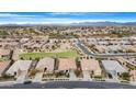 Aerial view showcasing a desirable neighborhood with mountain views at 21576 E Pecan Ct, Queen Creek, AZ 85142