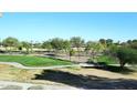 Expansive golf course view with a bridge surrounded by greenery, under a clear sky at 5122 E Shea Blvd # 1117, Scottsdale, AZ 85254