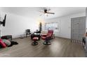 Spacious living room with hardwood floors and plenty of natural light at 5835 E Dodge St, Mesa, AZ 85205