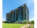 Modern high-rise building with green lawn at 7120 E Kierland Blvd # 307, Scottsdale, AZ 85254