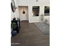 Bright entryway with hardwood floors, leading to living areas at 2738 E Cherry Hill E Dr, Gilbert, AZ 85298