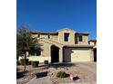 Charming two-story home with stucco exterior, tile roof, and a two-car garage at 2738 E Cherry Hill E Dr, Gilbert, AZ 85298
